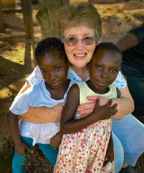 Joy Allen headshot with friends